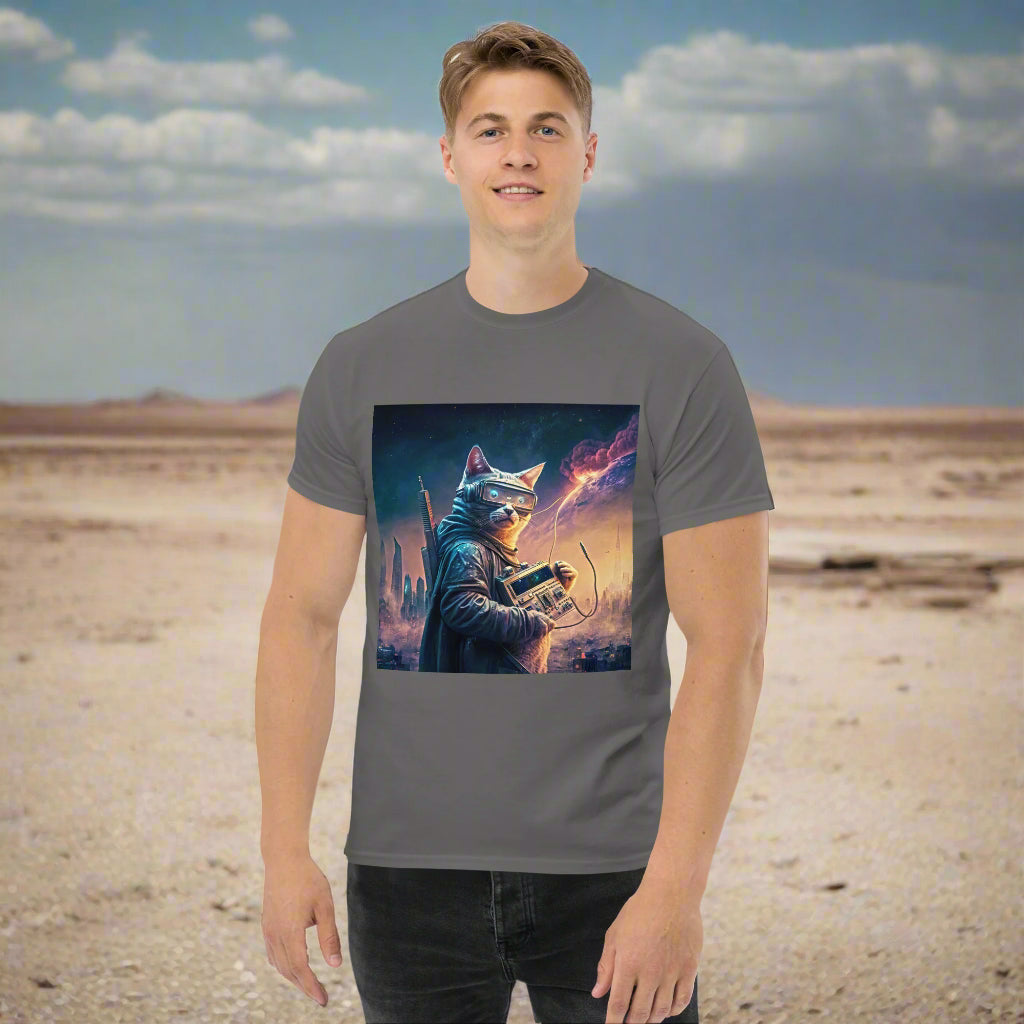 A man wearing a gray t-shirt with a printed image of a character resembling a cat-like warrior in a futuristic setting.